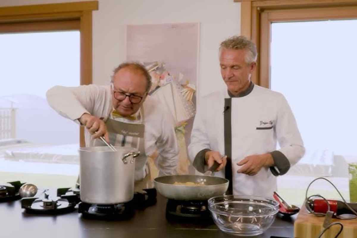 cuoco e aiuto cuoco ai fornelli